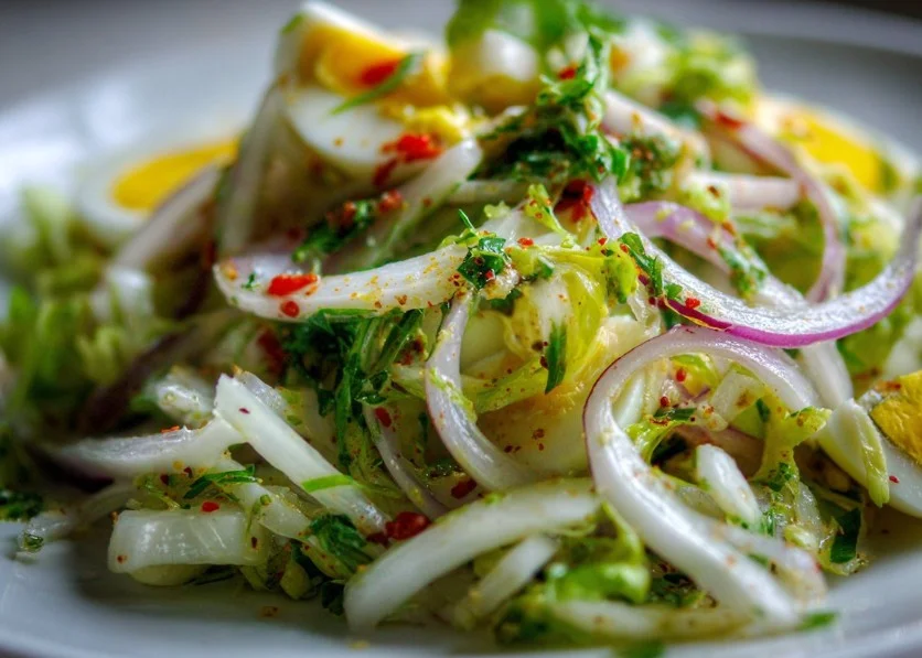 Delicious Frog Eye Salad served in a bowl with fruit and pasta