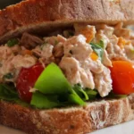 Delicious tuna salad sandwich with fresh ingredients on a plate