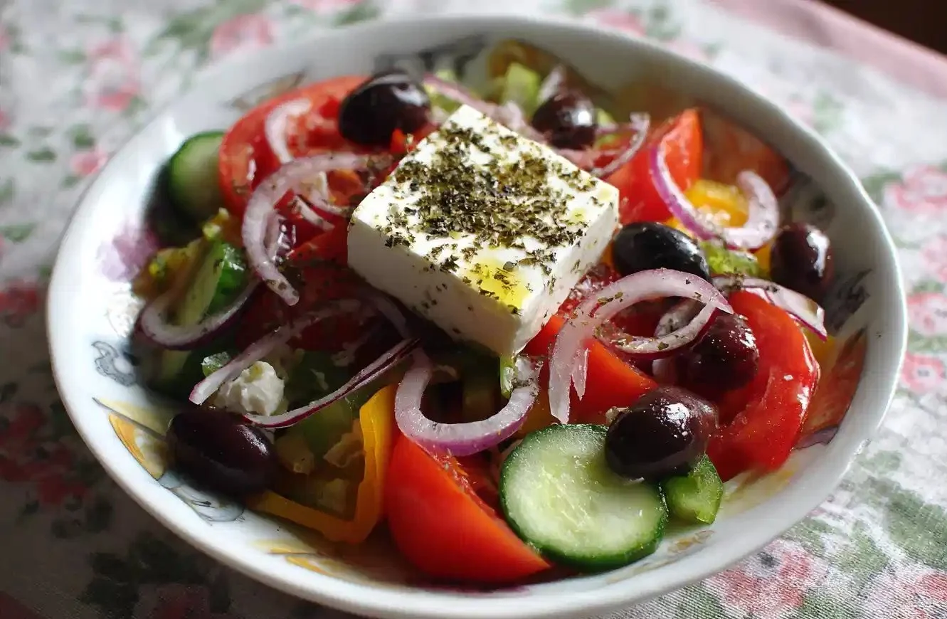 Fresh Greek Salad with tomatoes, cucumbers, olives, and feta cheese